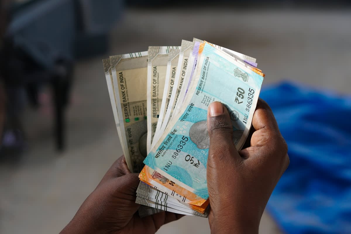 African currency notes and digital payment symbols