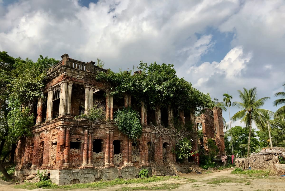 ancient library ruins contrasting with a modern motherboard
