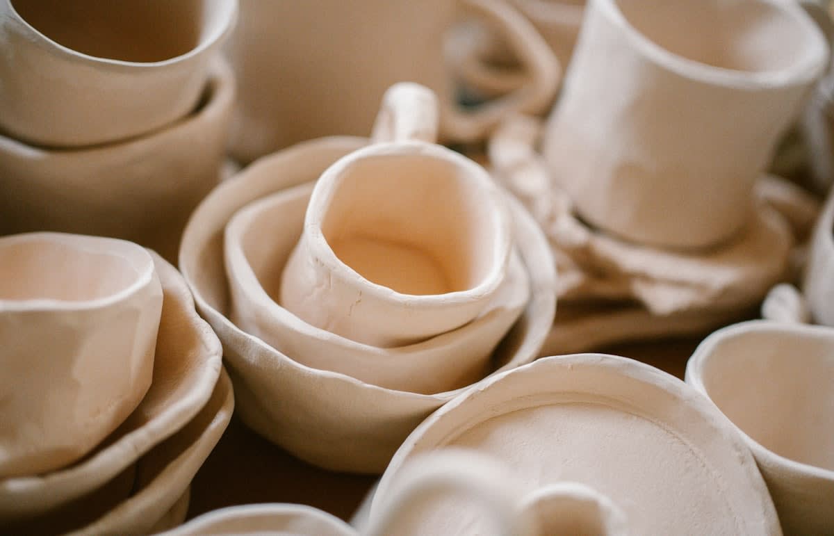 Handcrafted ceramic pottery with visible imperfections