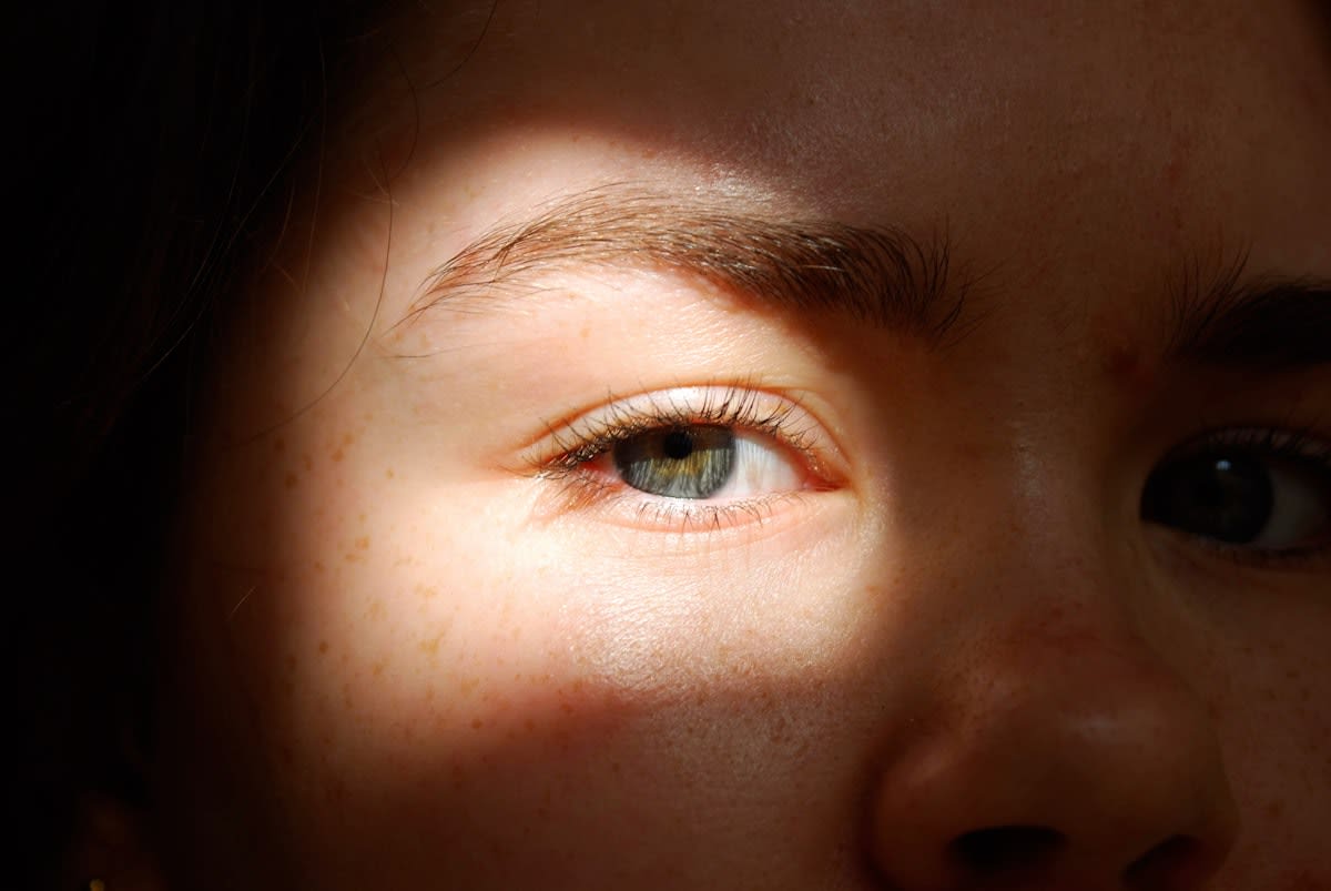 Morning sunlight hitting a person's face
