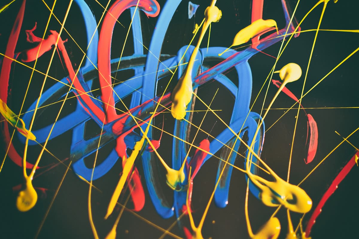 Abstract representation of neural networks merging with organic paint splashes