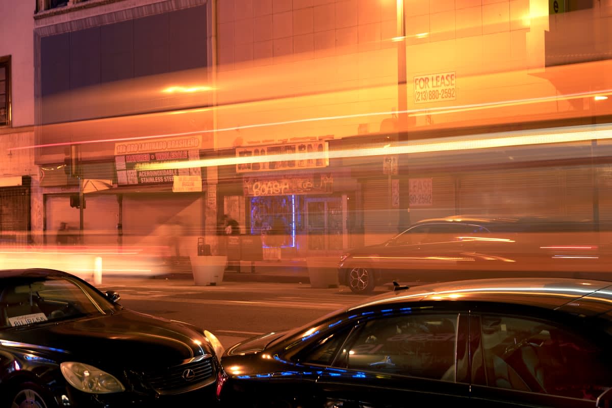 blurred city lights and traffic in a busy metropolitan area