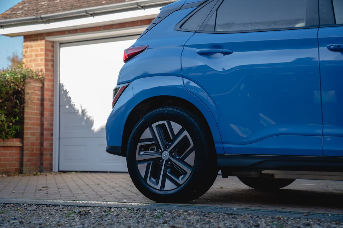Electric vehicle charging in a modern residential garage