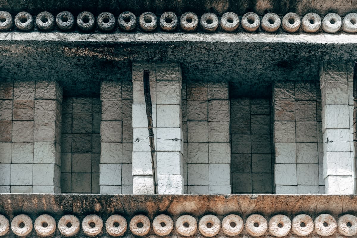 Ancient stone architecture contrasted with a modern data center