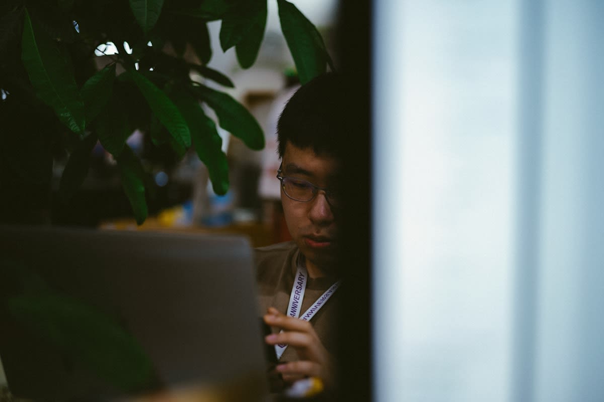Close up of a focused person working