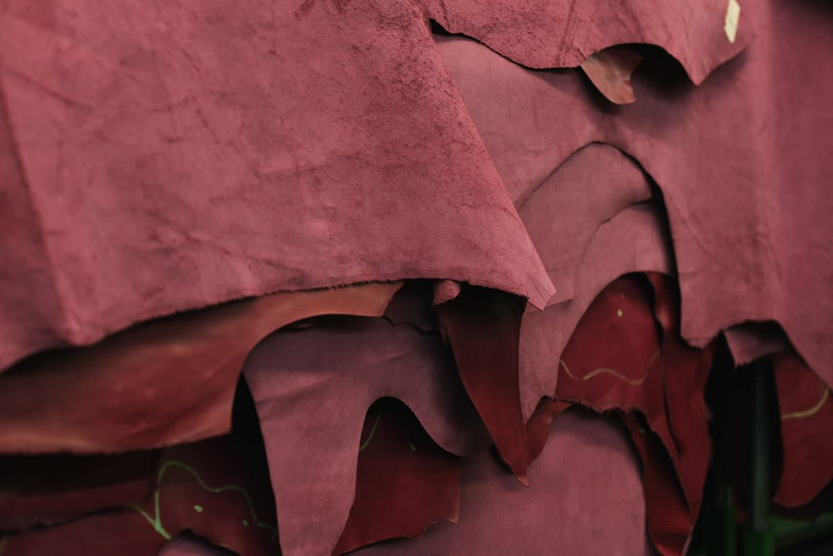 Close up of hand-crafted leather with visible natural grain and slight irregularities