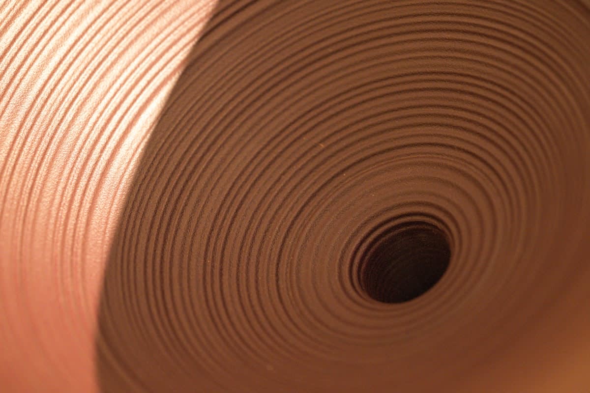 Tactile materials like clay, paper, and wood