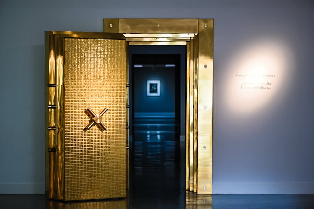 Gold bars stacked in a vault
