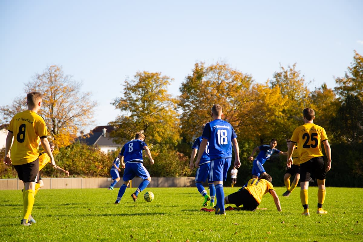 Soccer players with GPS tracking vests during training
