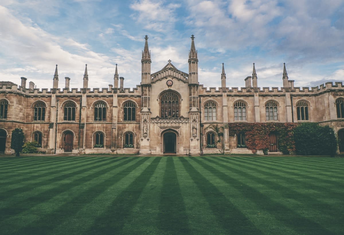 Ancient university architecture with modern students
