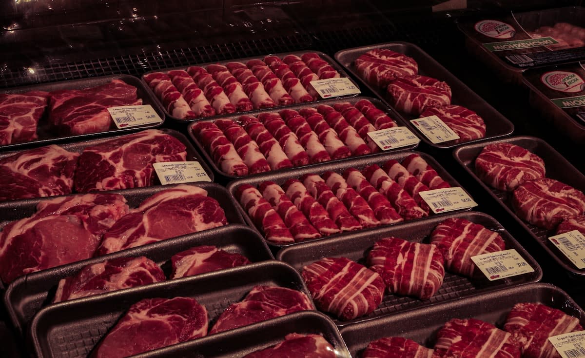Grocery store price tags and meat section