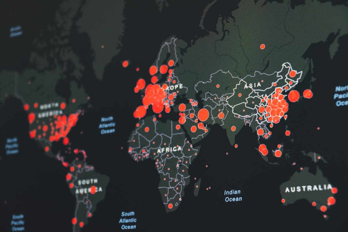 Global map with connecting lines representing distributed teams