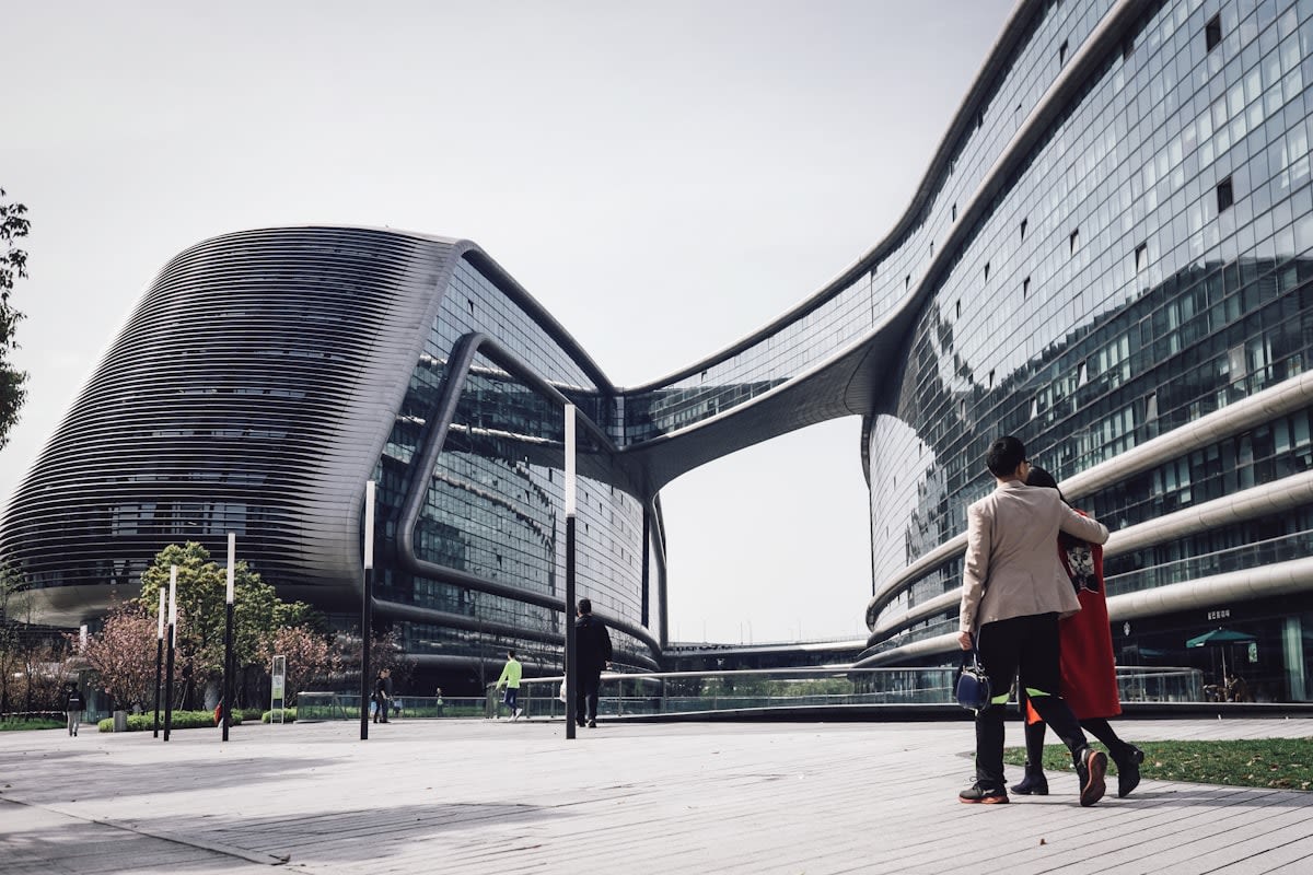 Modern walkable city center with pedestrians and high-rise architecture