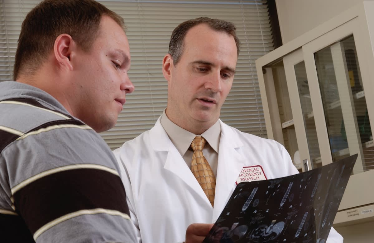 Doctor and patient reviewing data on a screen