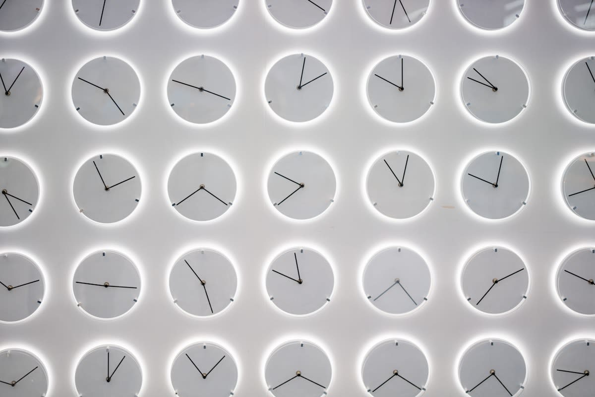 Clock face merging into a biological cell