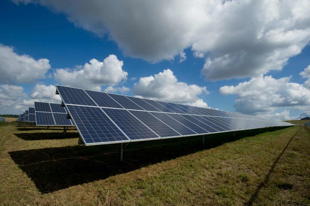 Modern hydrogen production facility next to a solar array