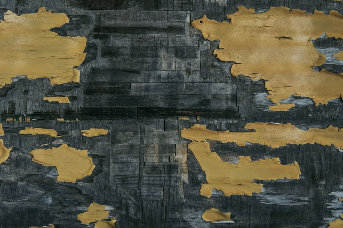 Abstract representation of a dividing line between gold and grey textures