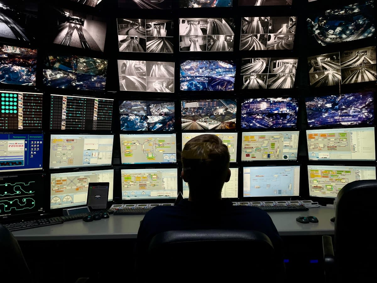 High tech control room with satellite monitors