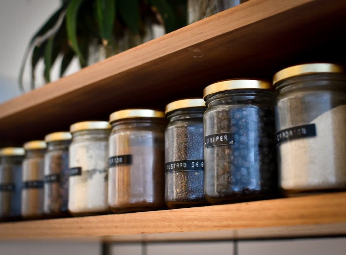 Diverse heirloom seed varieties in glass jars