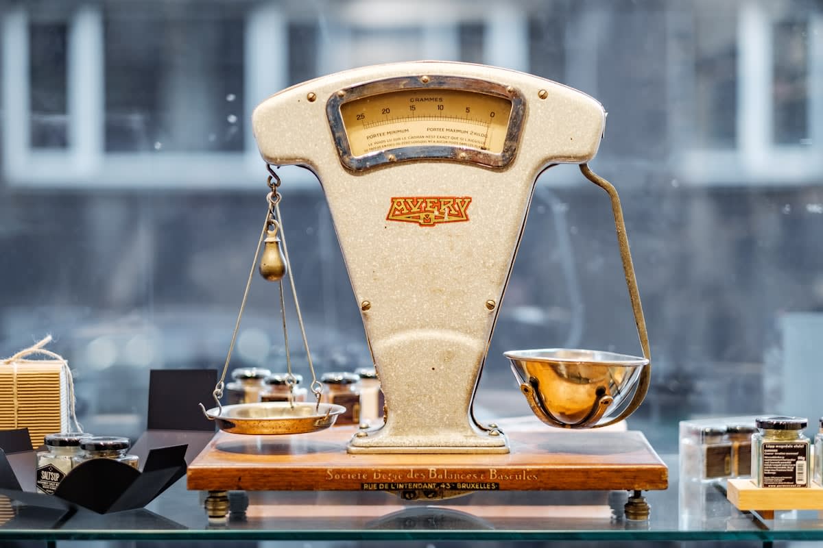 financial weights and balance scale