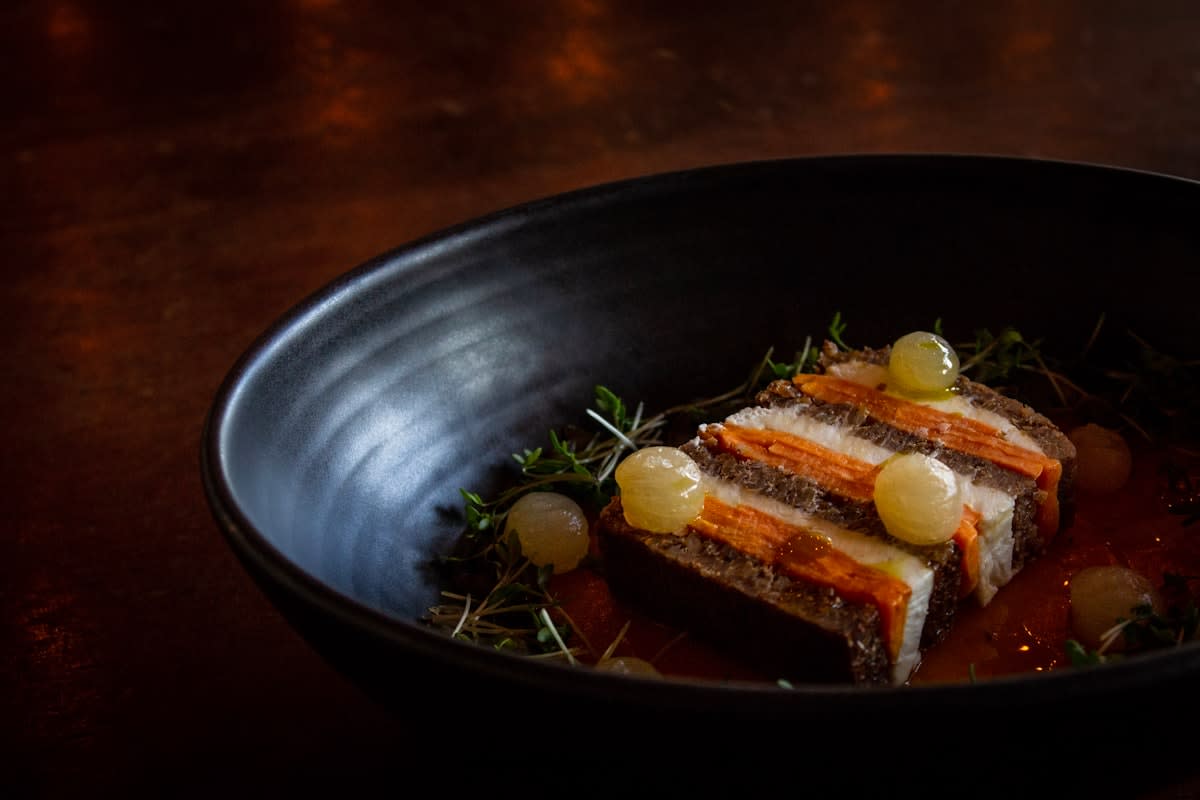 High-end gourmet dish featuring sustainable ingredients