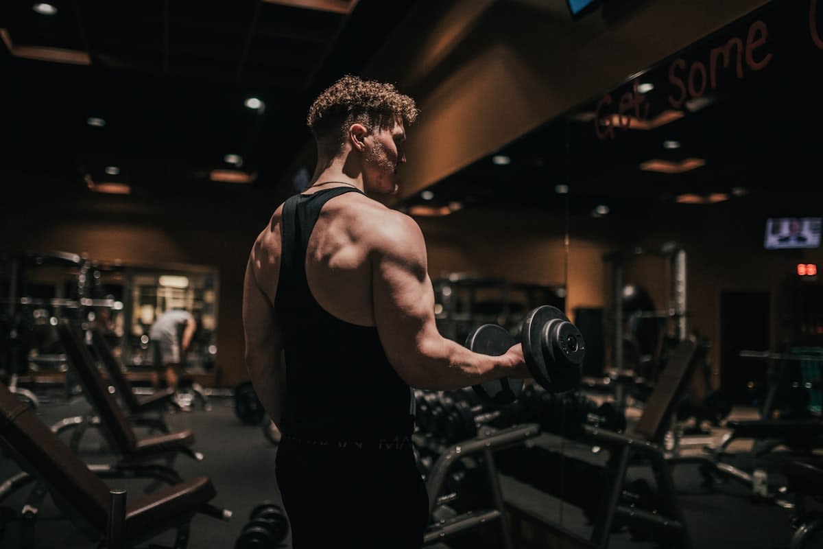 Person exercising in a modern gym