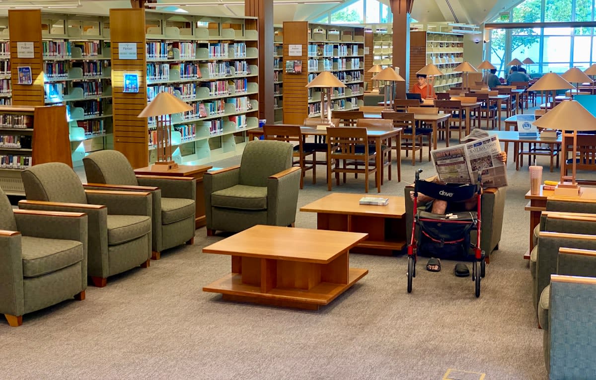 Modern public library interior with community spaces