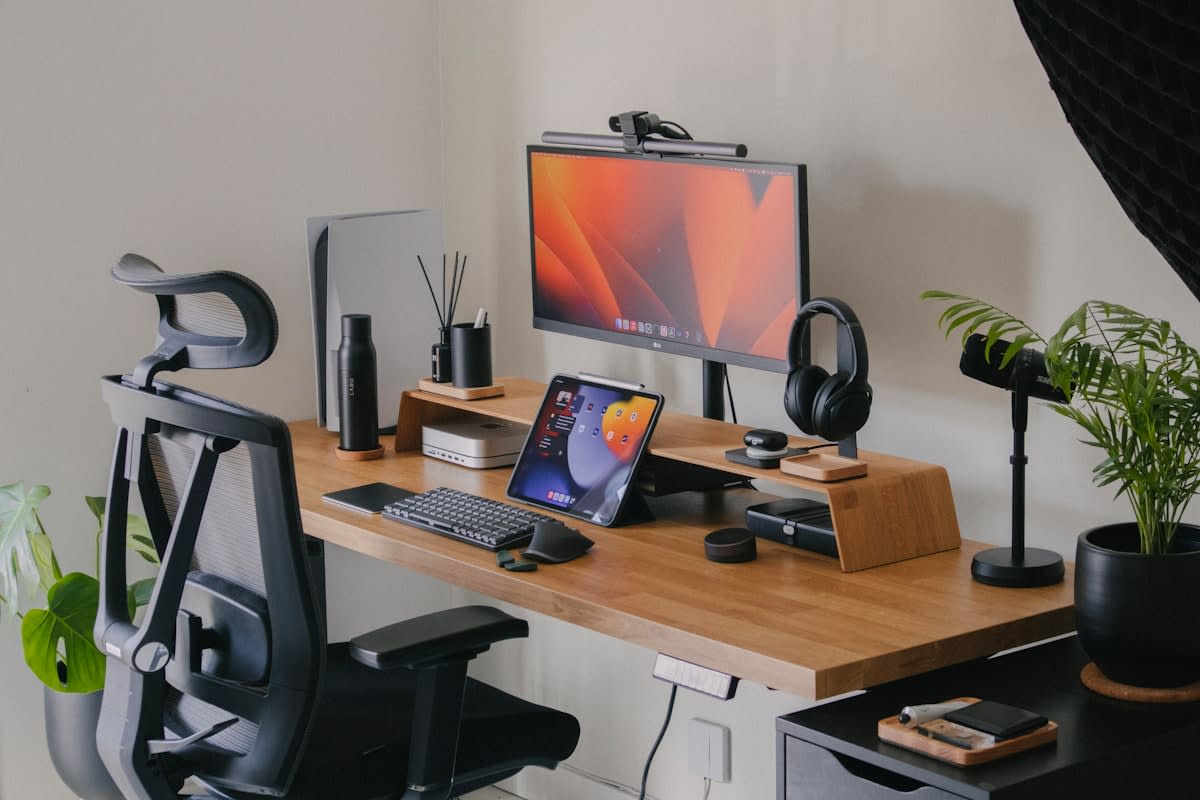 minimalist home office with multiple monitors