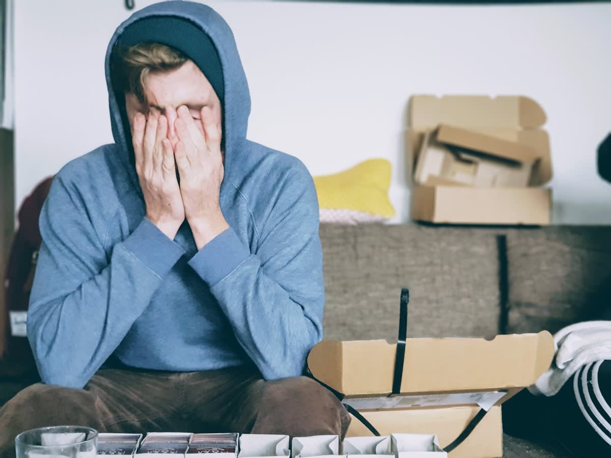 A person looking overwhelmed by many options on a screen