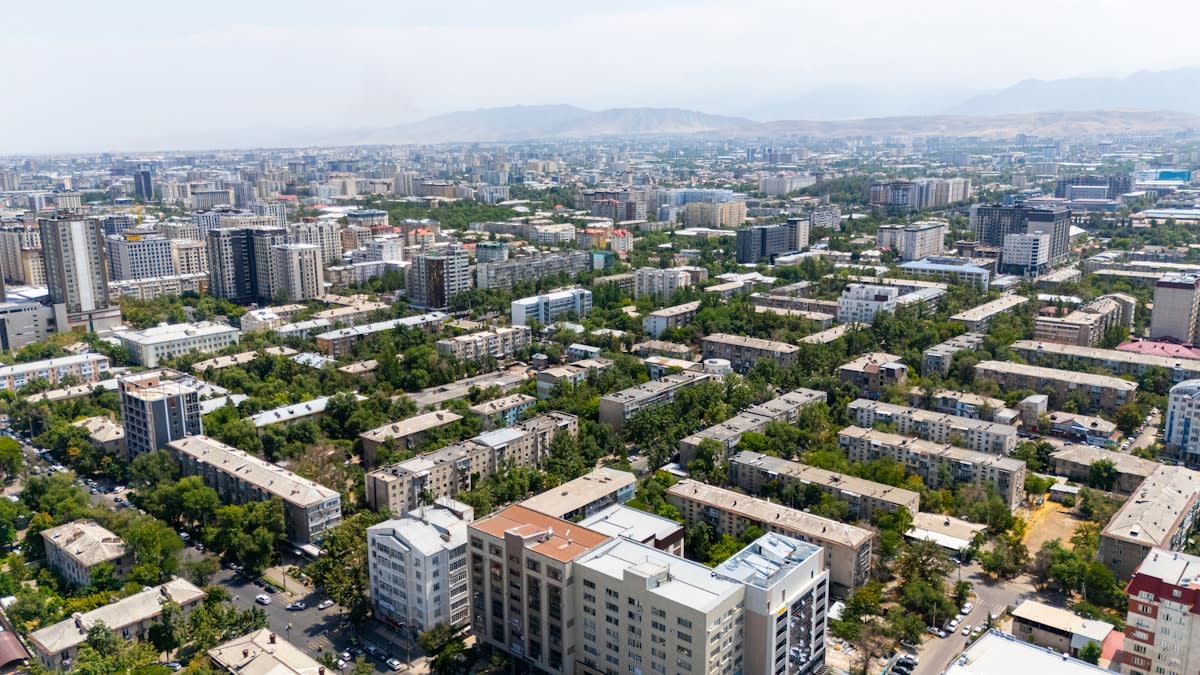 Dense urban cityscape with a mix of high-rise apartments