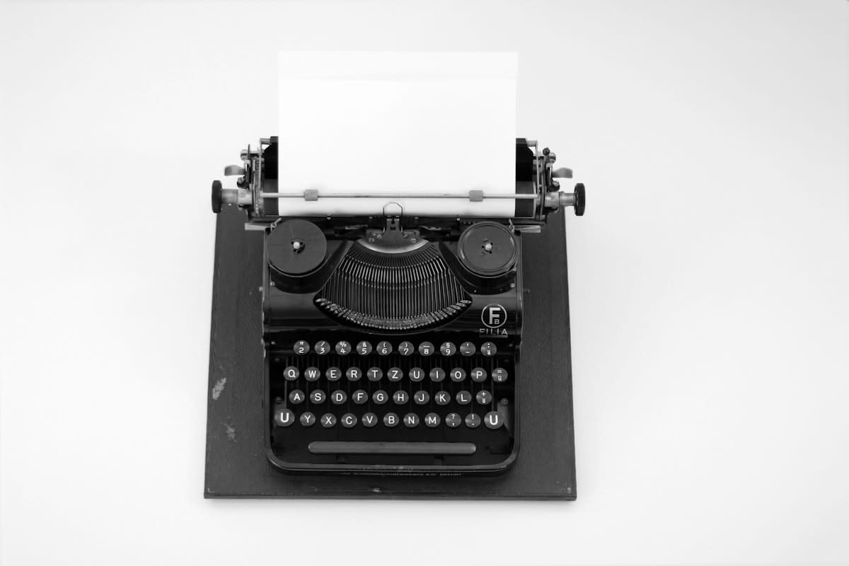 Close up of a typewriter with a blank page