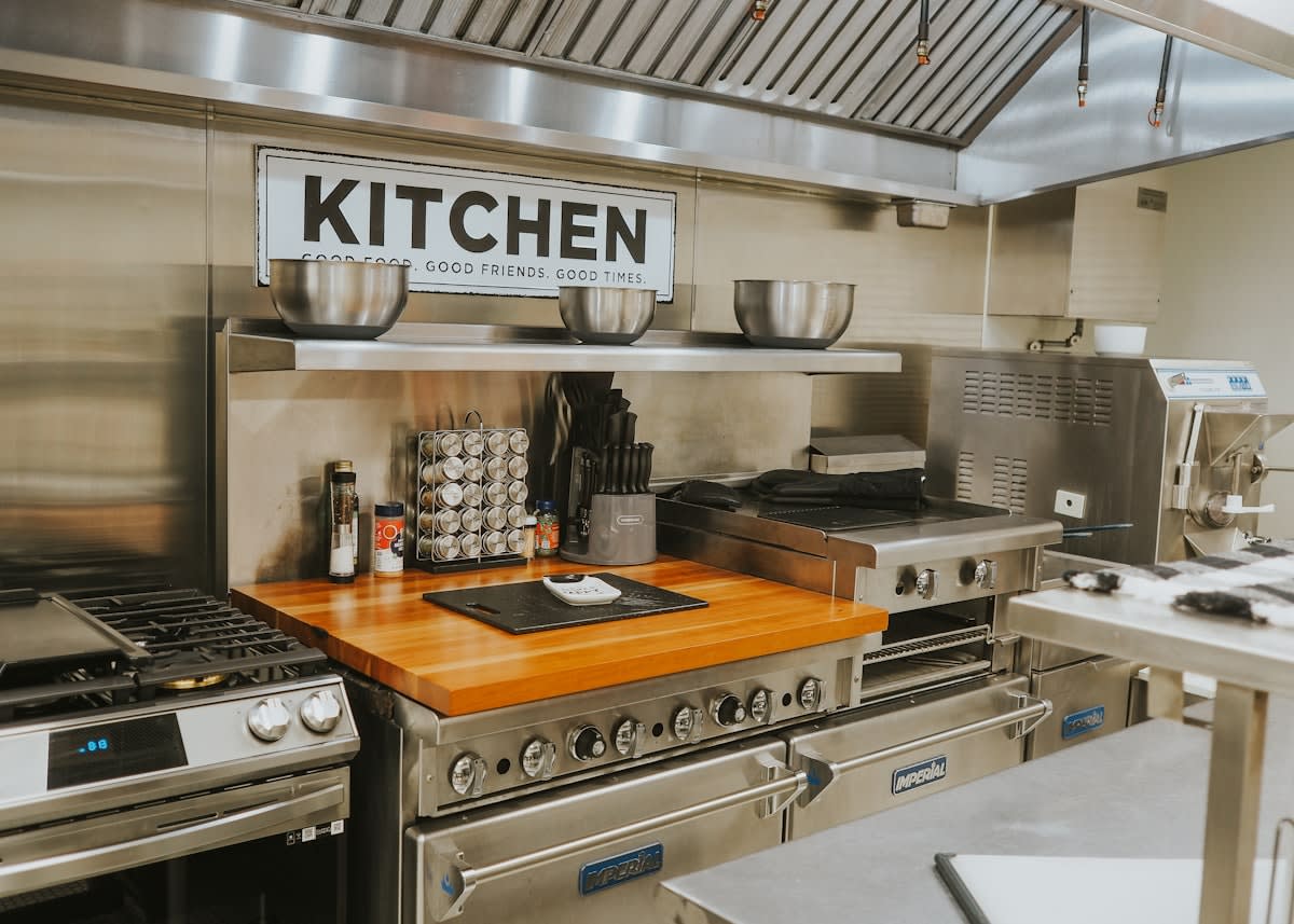 Organized professional kitchen prep station with mise en place