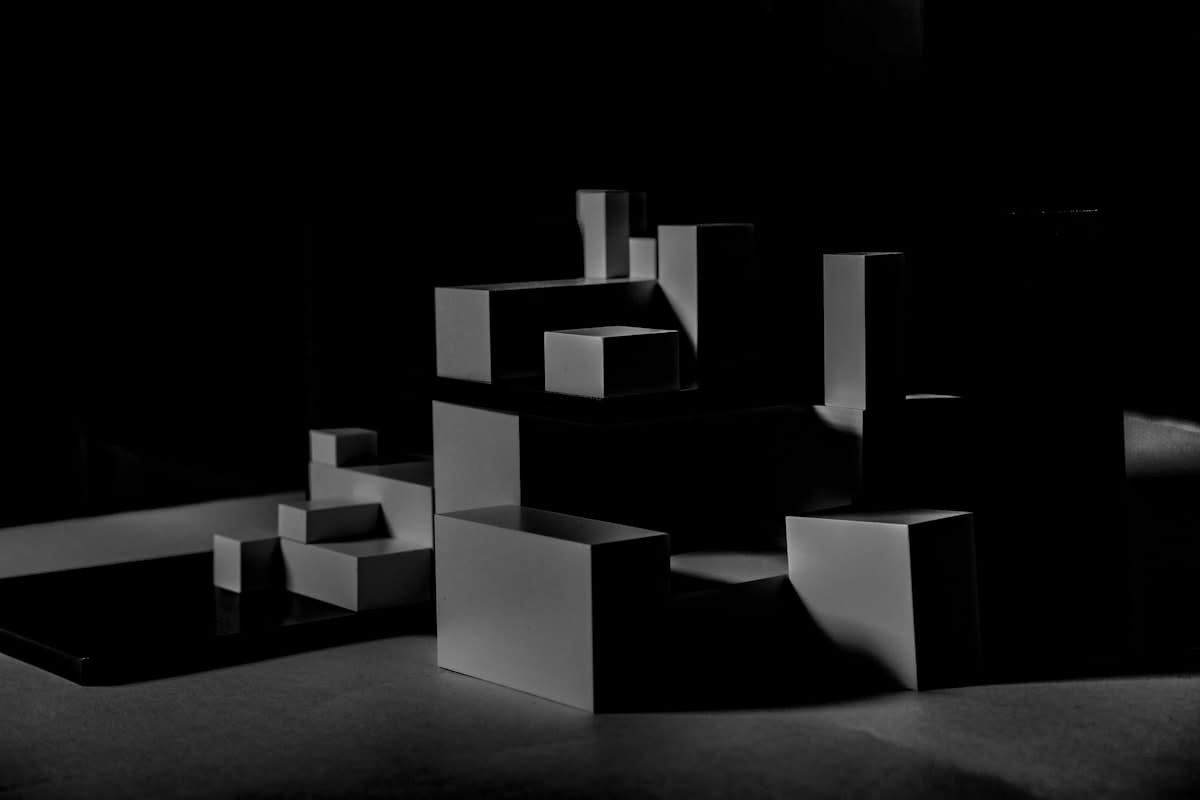 Minimalist architectural space with high contrast light and shadow