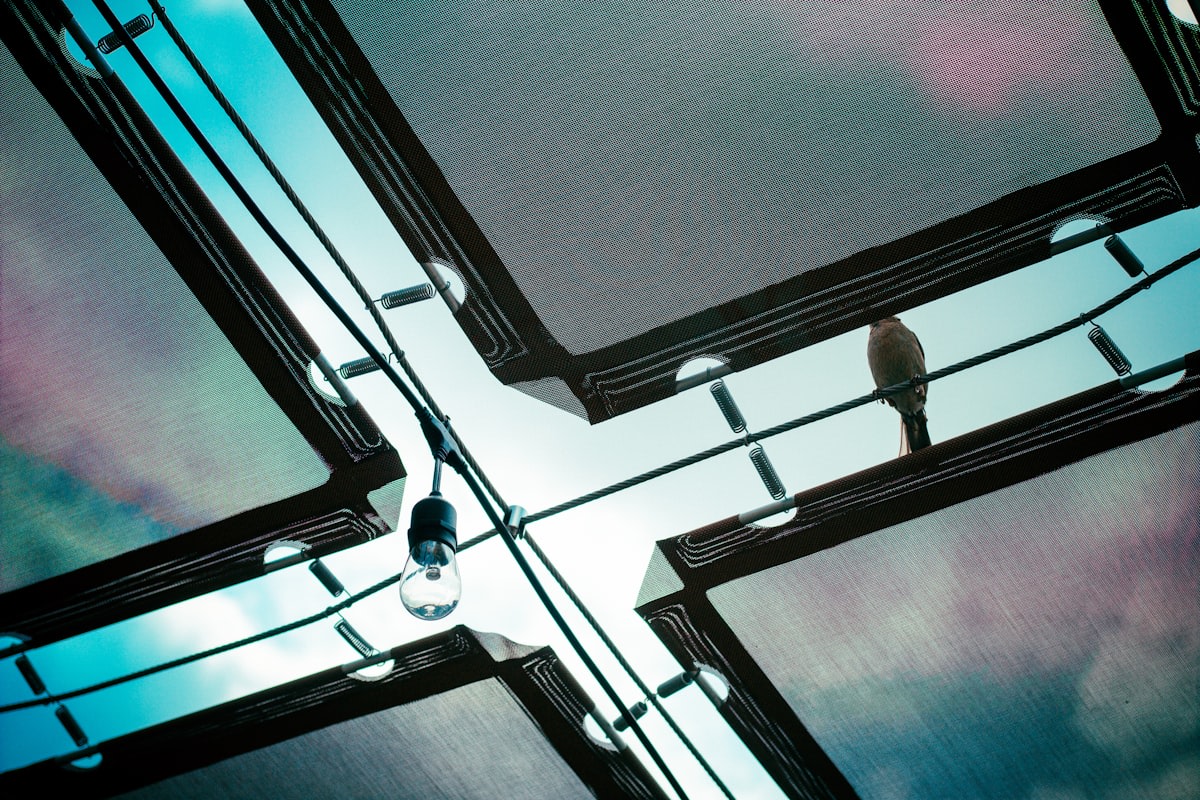 A person standing at a crossroads in a modern city