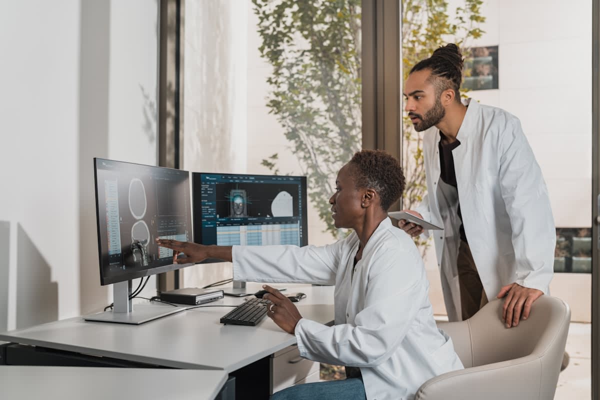 Medical professional analyzing body composition data