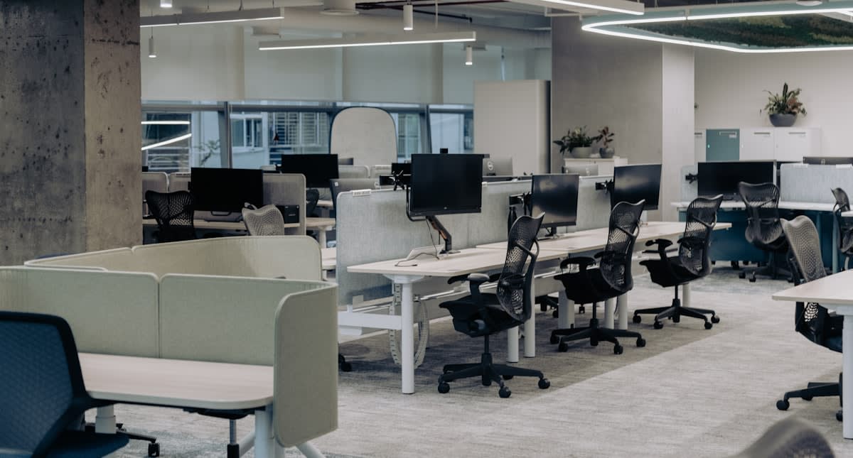 Empty modern office space with focused lighting