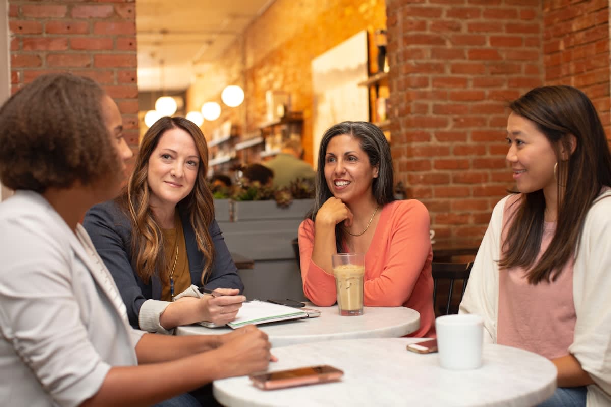 Diverse group of adults engaged in a complex collaborative discussion