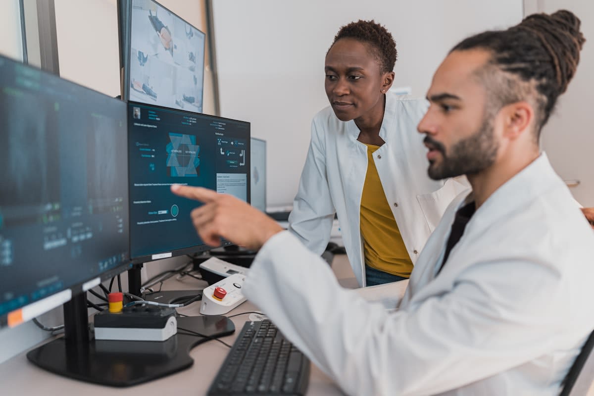 Doctor reviewing digital health data on a screen
