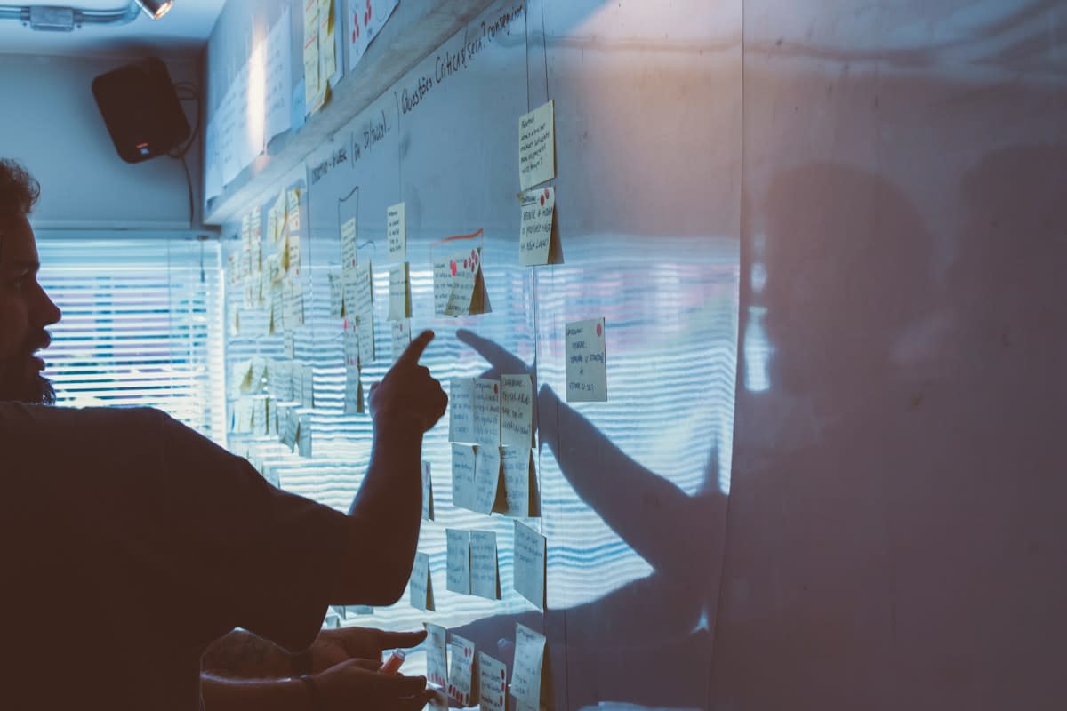 Professional working on a complex strategy board