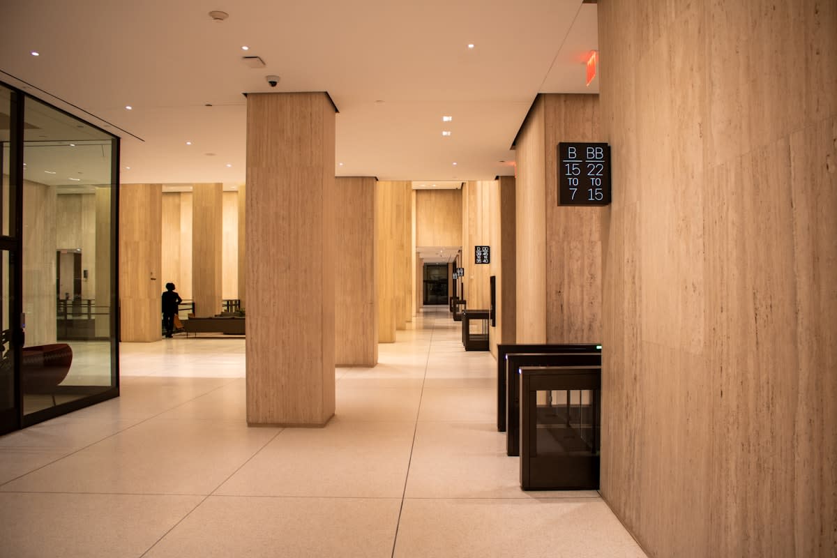 empty modern office lobby with digital kiosks