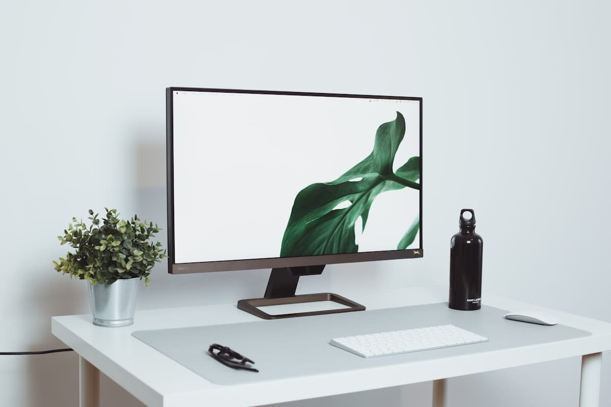 Minimalist workspace with a single monitor and no distractions