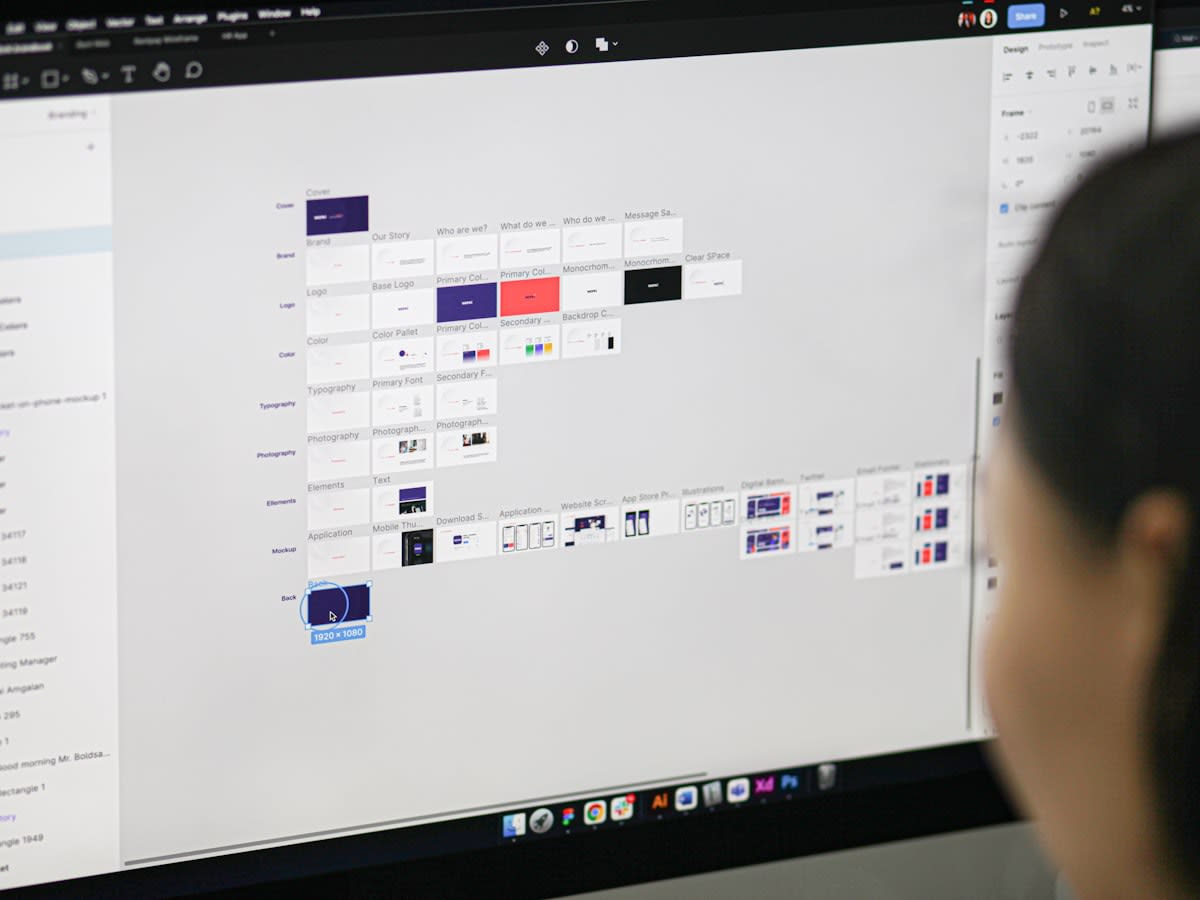 Person interacting with multiple digital screens