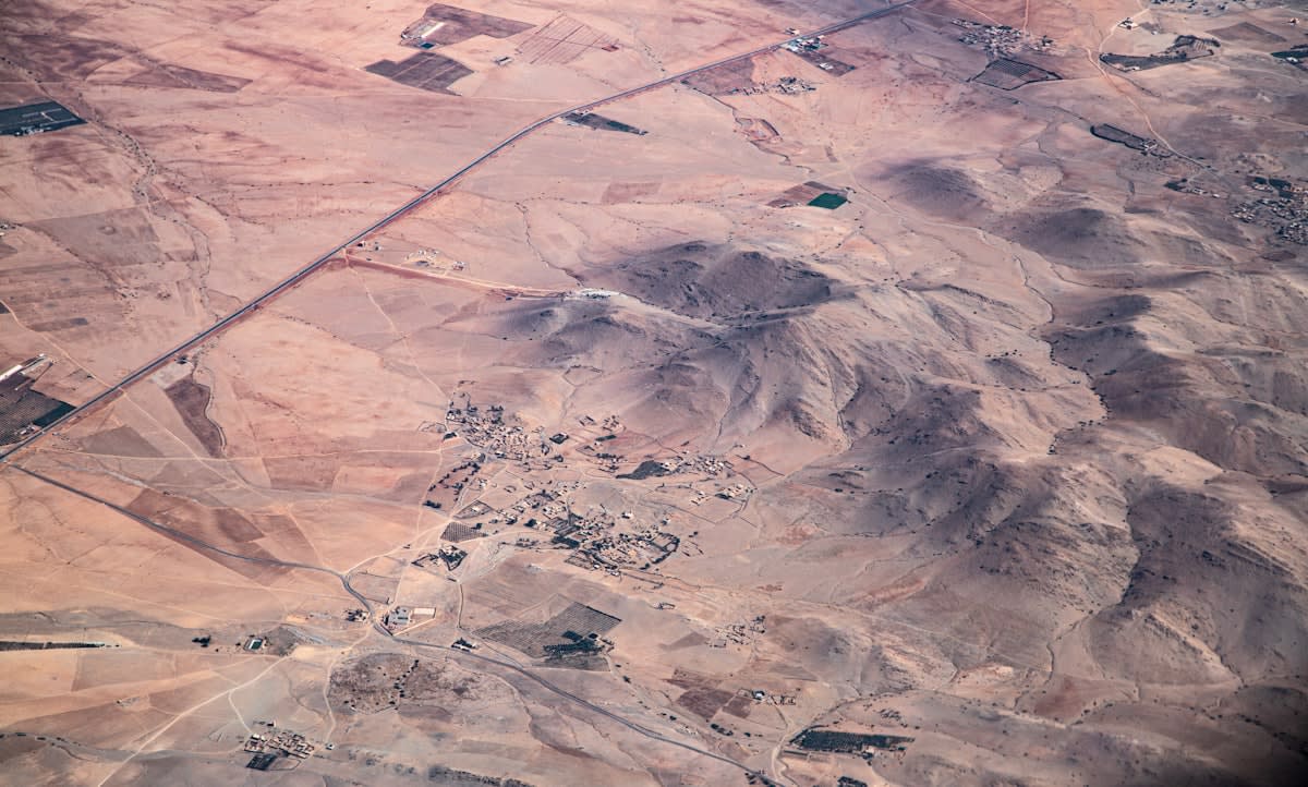 Aerial view of experimental salt-tolerant crop plots in a desert region