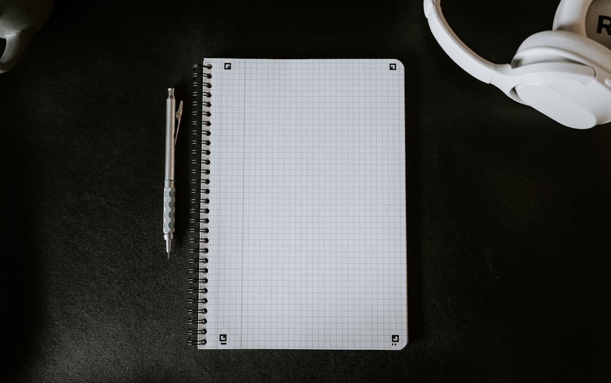 Analog notebook and fountain pen on a clean desk
