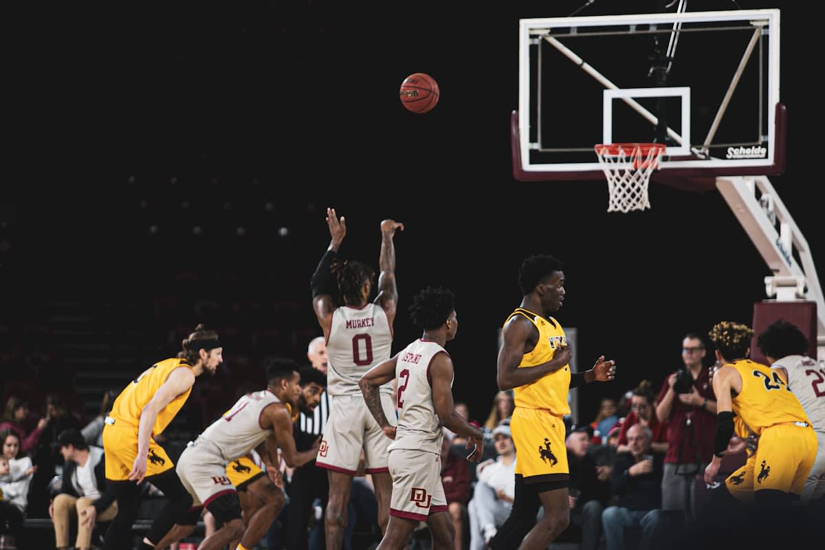 Basketball player focusing on the hoop
