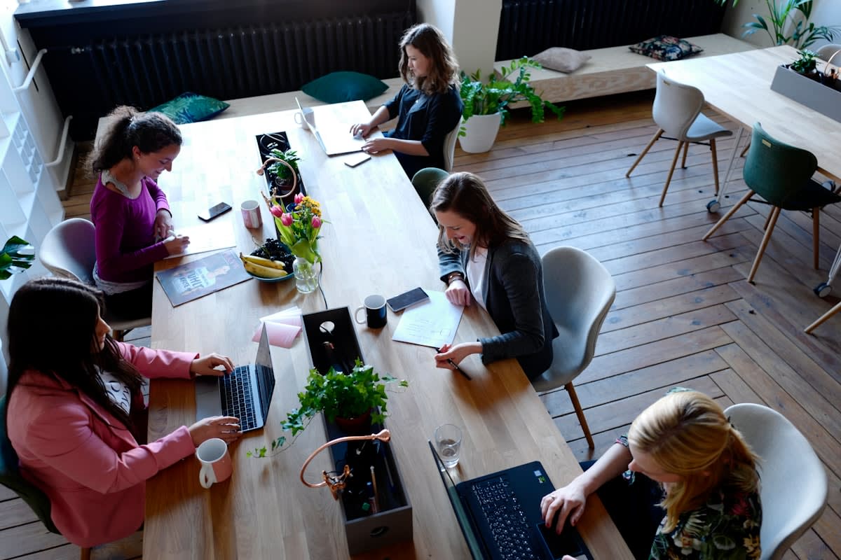 Modern co-working space with diverse people collaborating