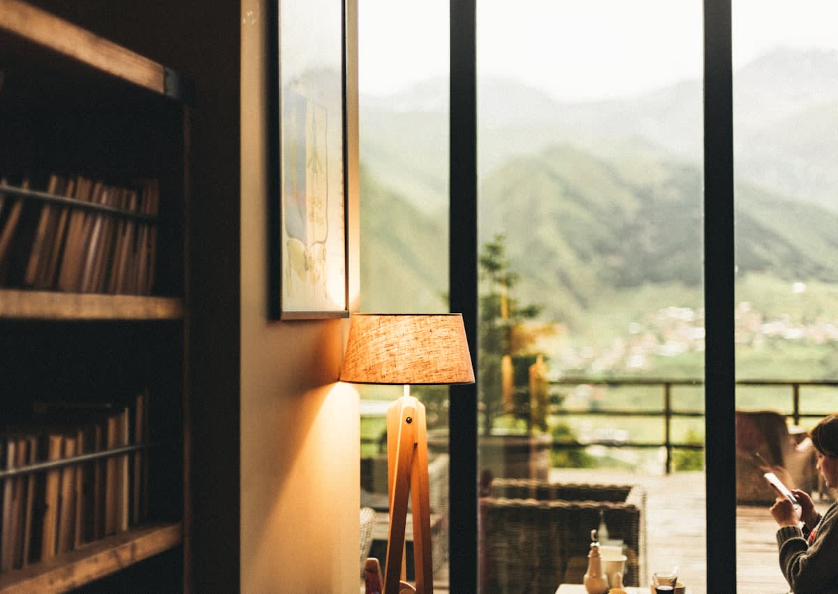 Minimalist luxury workspace with a view of a serene landscape