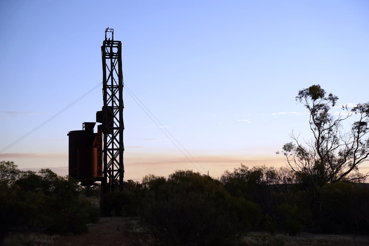 Industrial drilling rig in a desert landscape