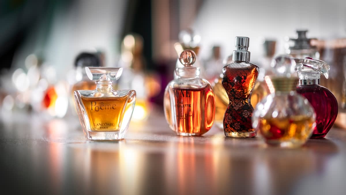 Close up of perfume bottles in a minimalist setting