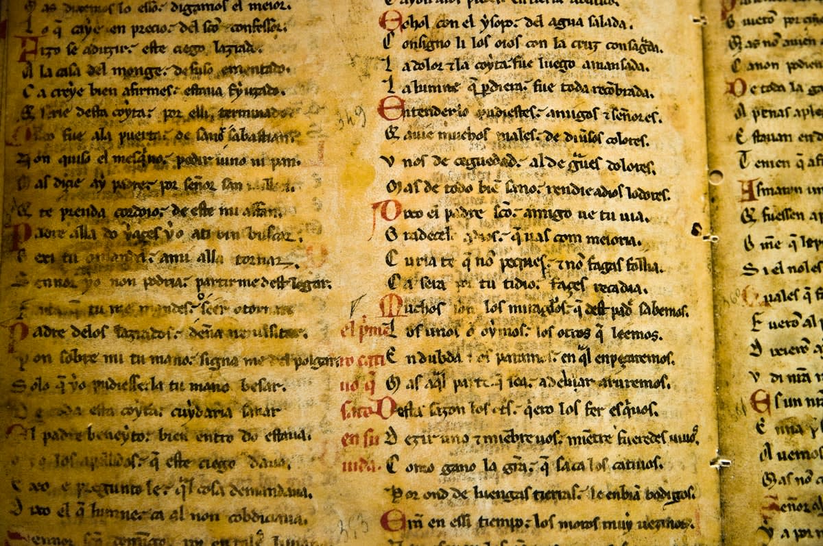 Ancient manuscript with handwritten notes in the margins
